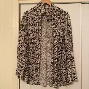 Buttoned down leopard print shirt.